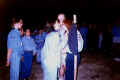 Ceremonias de promesa celebradas la noche antes del festival en el campamento de Palos de Moguer